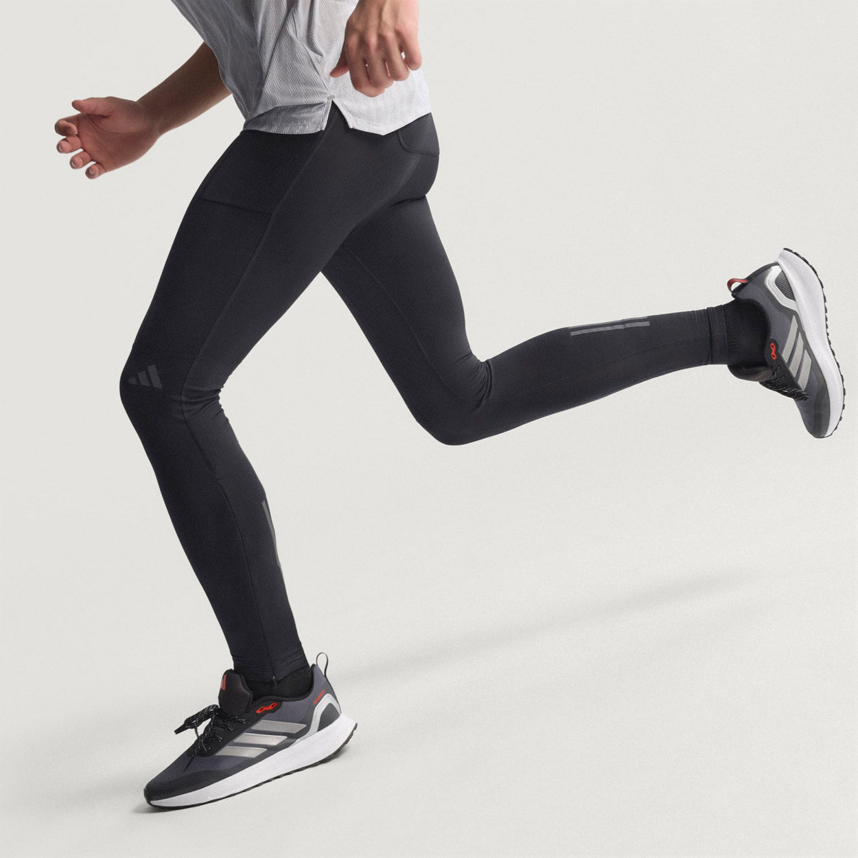 Own The Run Vindstopper Tights
